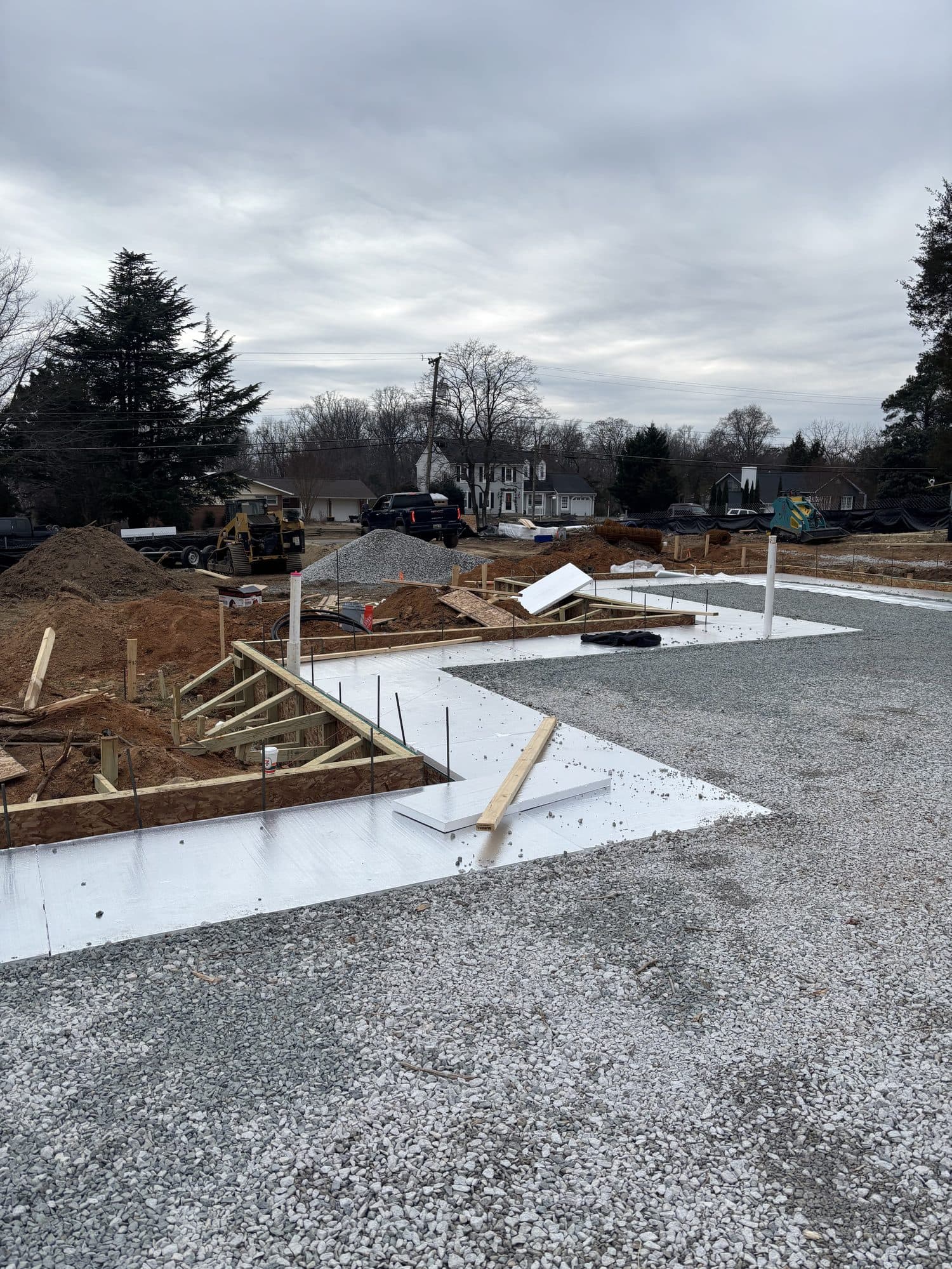 Foundation footings and gravel pad ready for slab. Foundation project by Potts Brothers Construction, Arlington & Northern Virginia