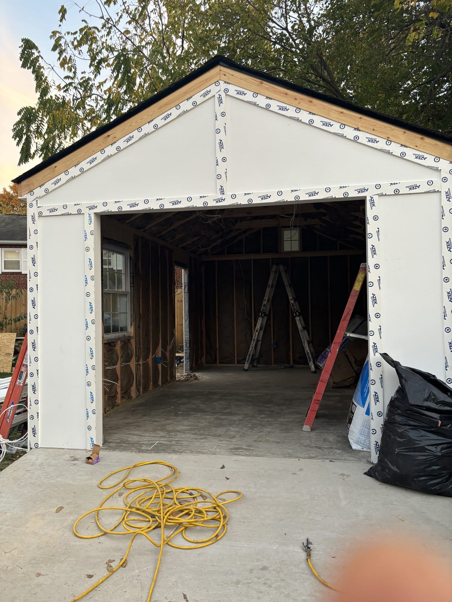 Detached garage front opening with taped house wrap. Garage project by Potts Brothers Construction, Arlington & Northern Virginia