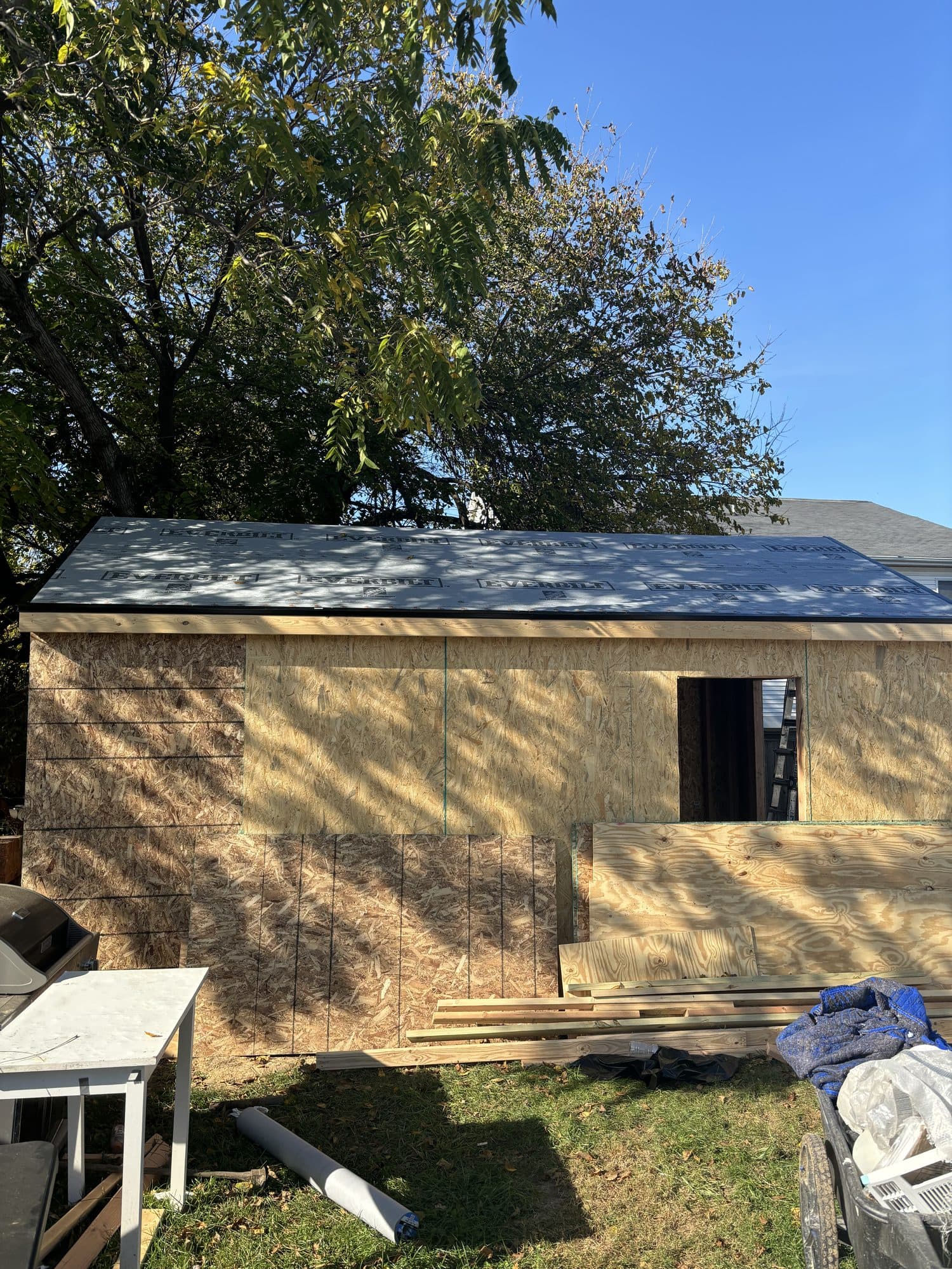 Detached garage with new shingled gable and sheathing. Garage project by Potts Brothers Construction, Arlington & Northern Virginia